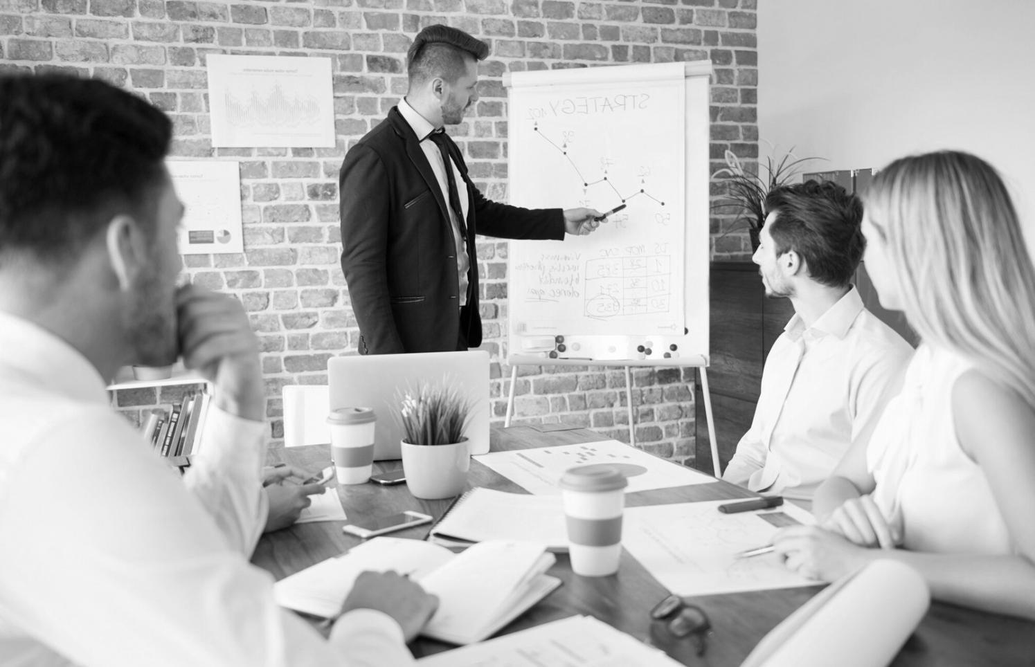 Corporate finance analyst reviewing financial data and reports